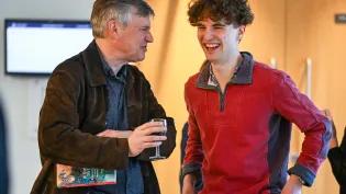 People talking in 50 George Square.