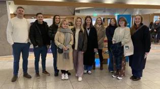 Students posing for photo in the Scottish Parliament.