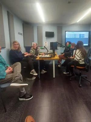 Students in radio studio. 