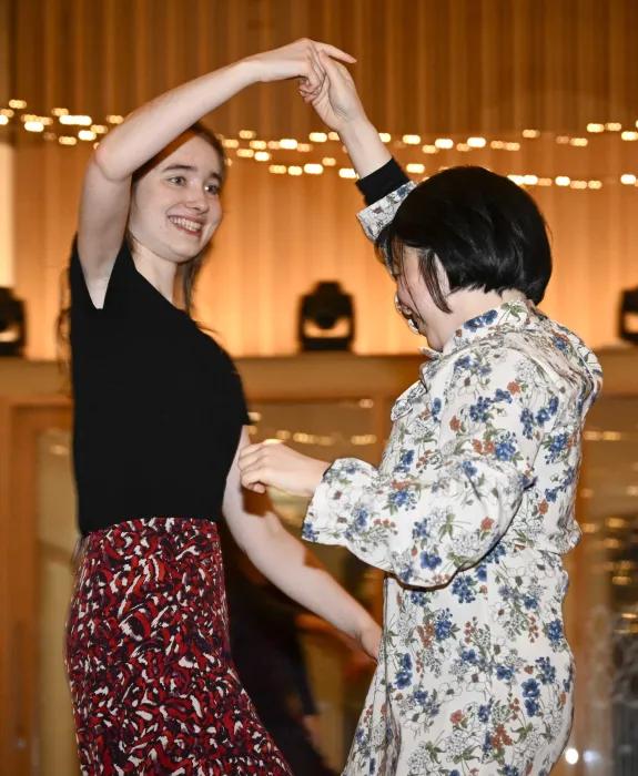 Two students dancing at ceilidh.